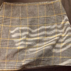 a cream mustard skirt